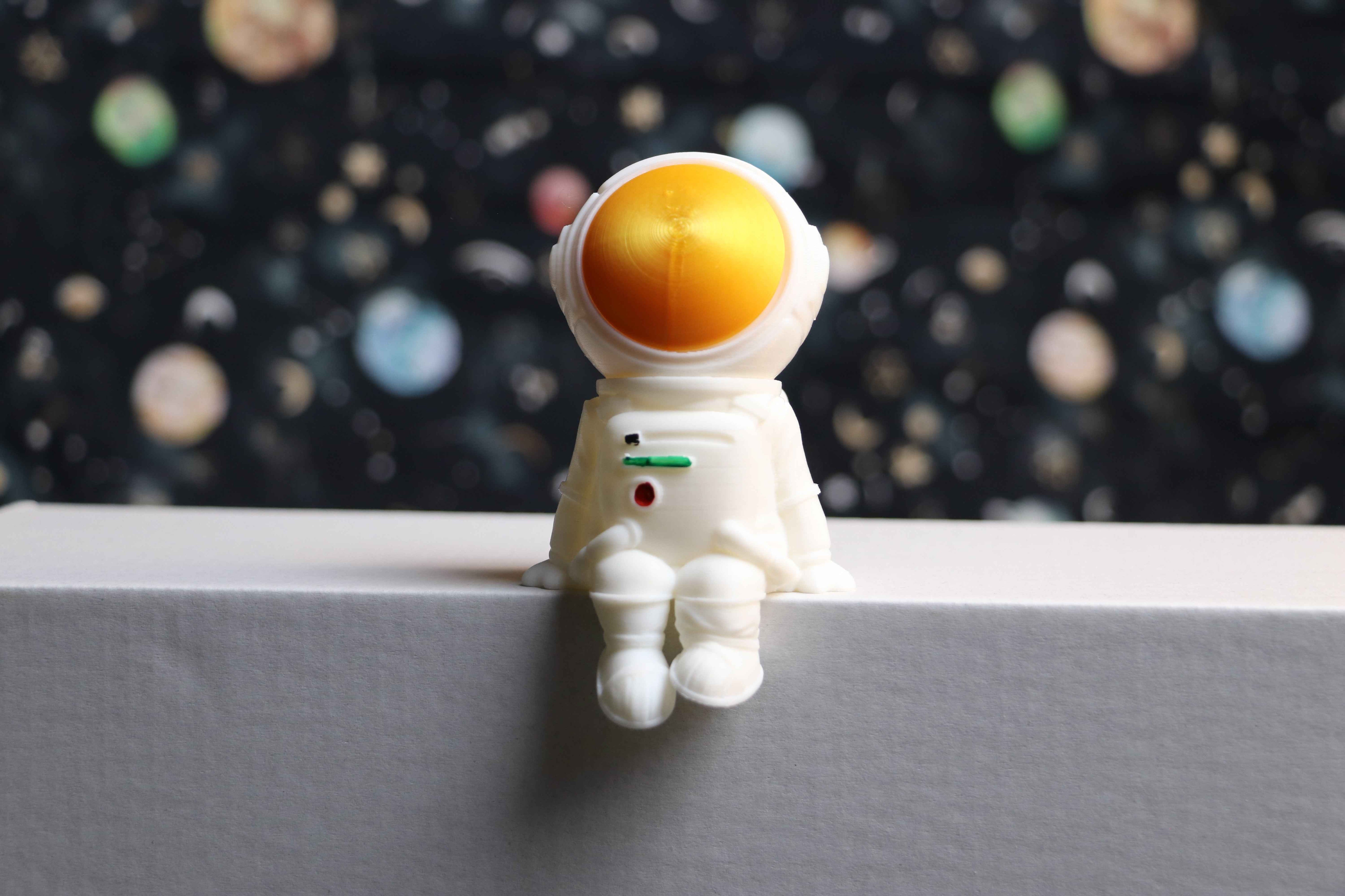 Astronaut Kantensitzer