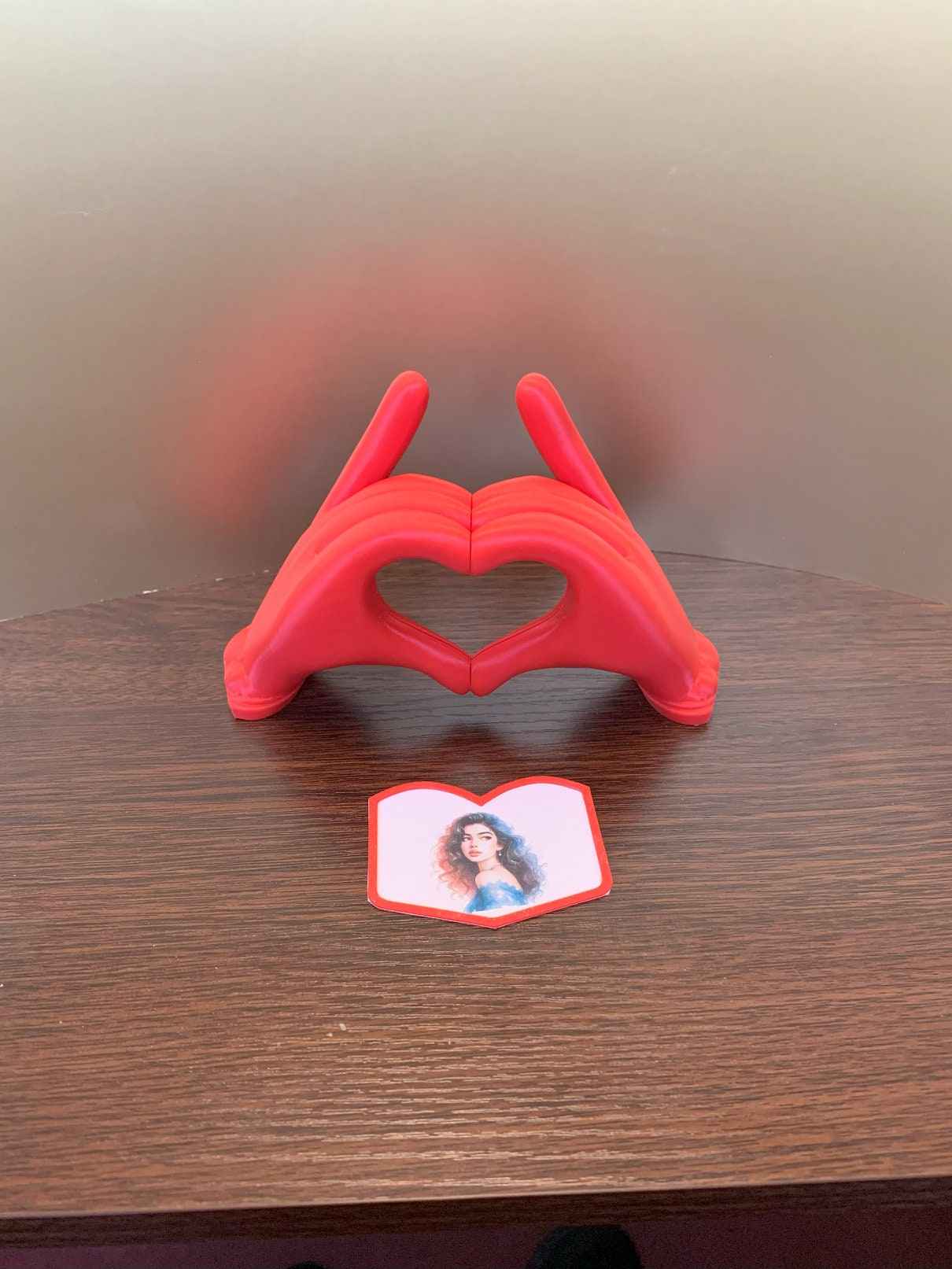 Herzhände als Foto- und Smartphone-Halterung