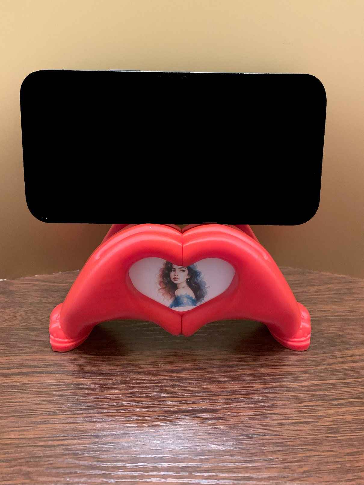 Herzhände als Foto- und Smartphone-Halterung